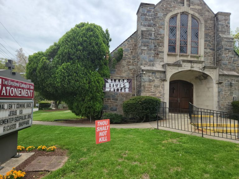 A church with a sign that says " for sale ".